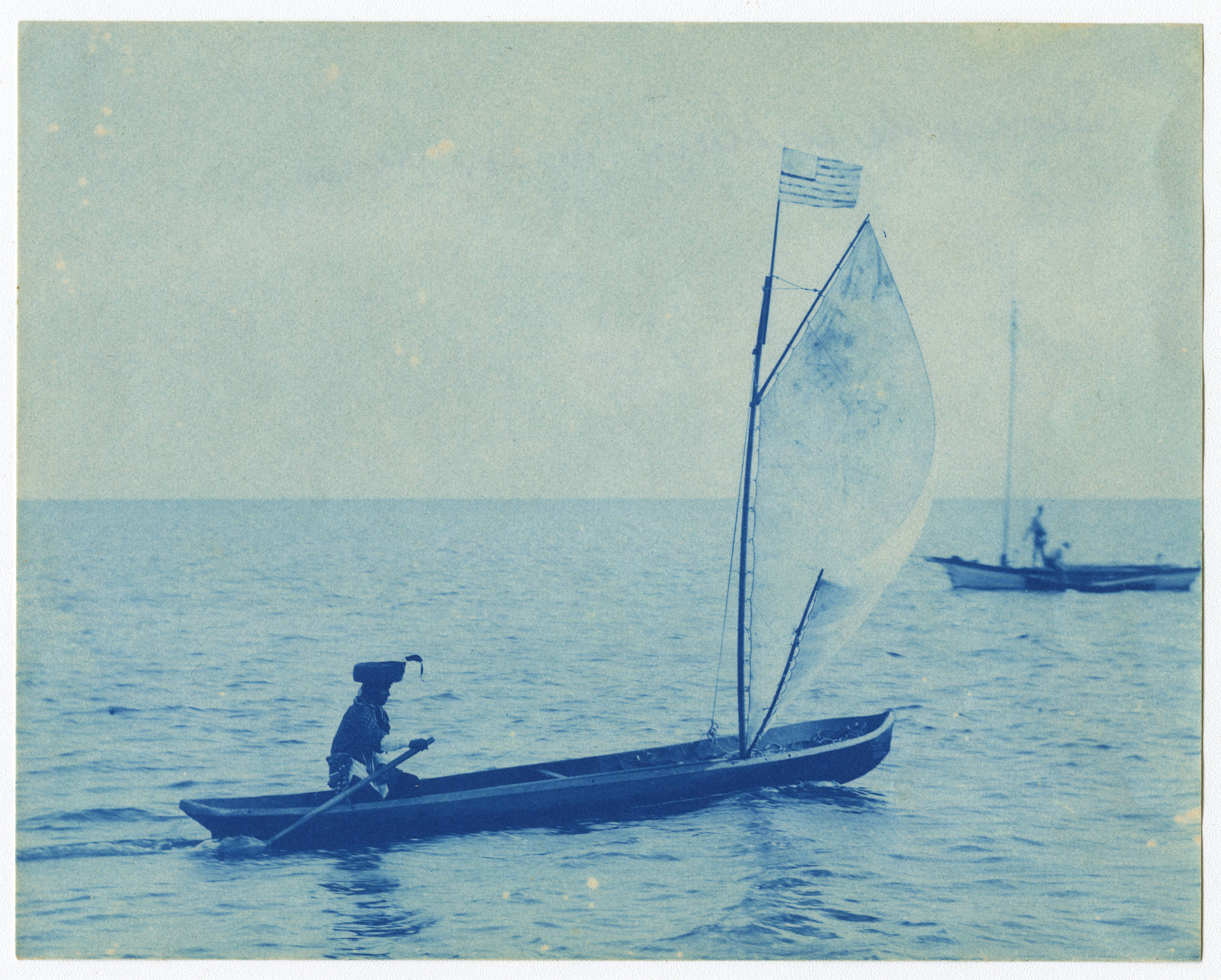 Seminole_indian_in_a_log_canoe_at_Barnacle